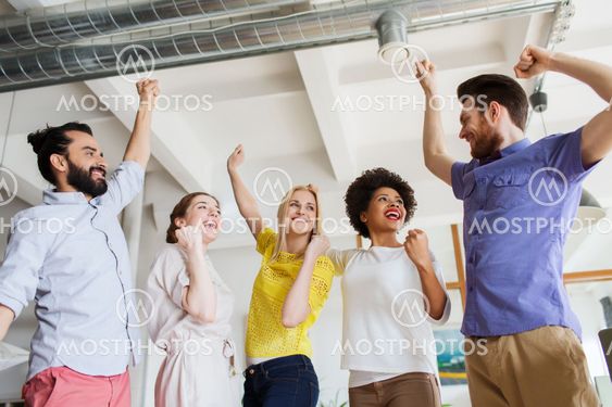 happy creative team in office