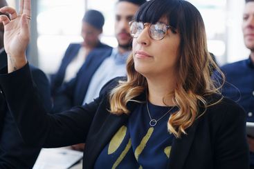 Event, question and seminar with business woman at...