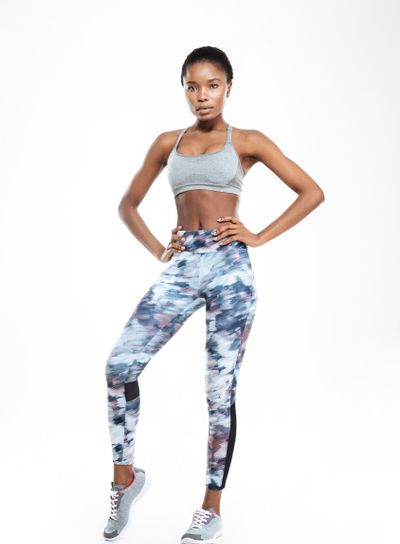 Full length portrait of a fitness afro american woman 