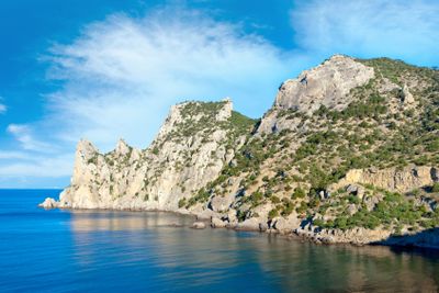 Summer rocky coastline with juniper trees ("Novyj Svit"...