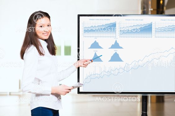 young business woman shows map of world