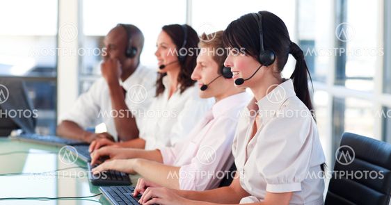 Portrait of a young multi-ethnic sale representative team at work
