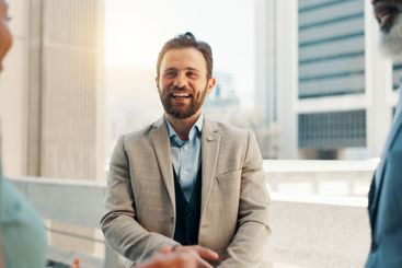 Meeting, happy and teamwork with business man in city...