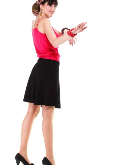 Full length woman in a turban isolated