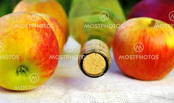 Apples and bottle of wine