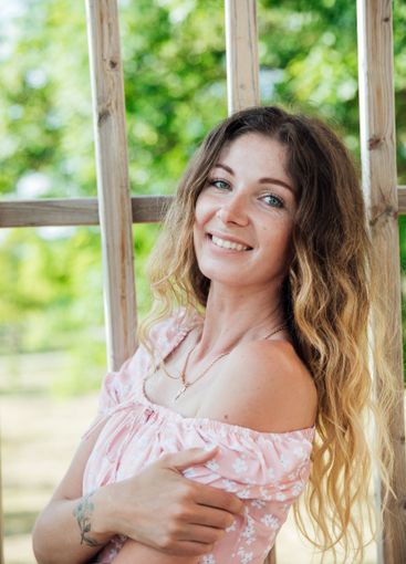 Beautiful woman in summer dress smiling