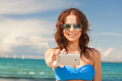 woman in bikini and sunglasses