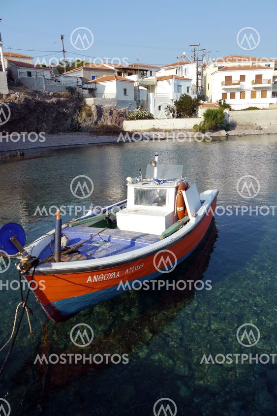 small boat in greek harbor