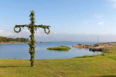 Maypole and the swedish archipelago in the background
