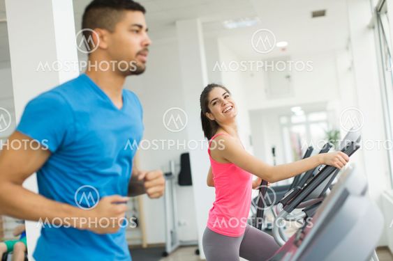 Young multiracial people training in the gym
