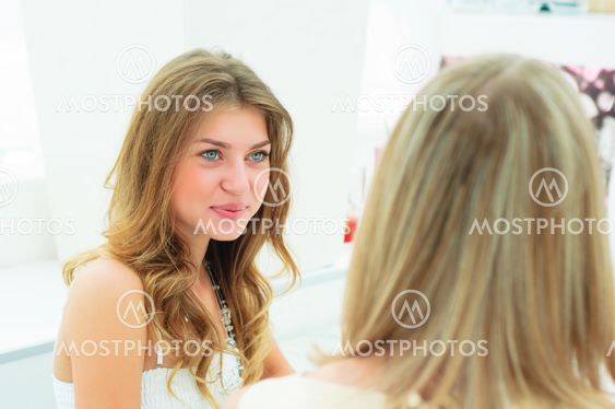 two beautiful women chatting in a cafe