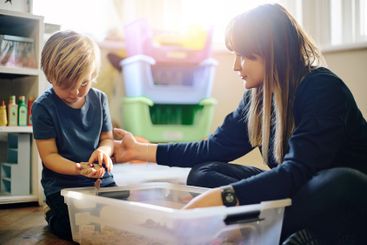 Family, toys or playing with a mother and son in a...