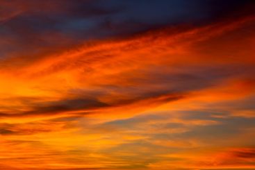 stunning sky post-sunset with vibrant shades of pink and...