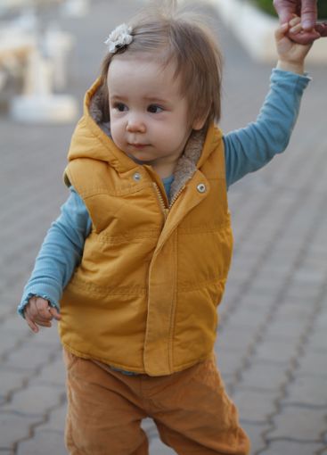 Cute little child girl outdoors. Childhood
