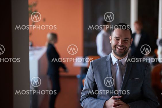 young business man portrait at modern office