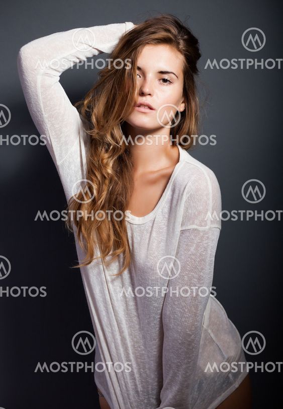 Portrait of hot woman in long sleeve white t-shirt