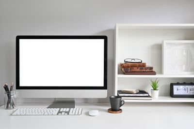Workspace Mockup Computer on Office Desk and Books,...