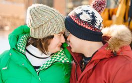 Winter plus size couple lovestory. Happy smiling man,...
