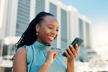 Happy, phone and business with black woman in city for...