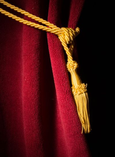 Red velvet curtain with tassel