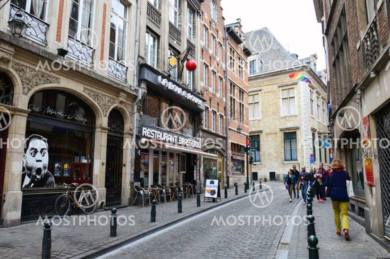 Brussels, Belgium - April 2015: Preserved old European-style residential and commercial buildings on streets of Brussels City, Belgium
