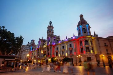 Dusk-lit Valencia City Hall, a must-see in hot Spanish...