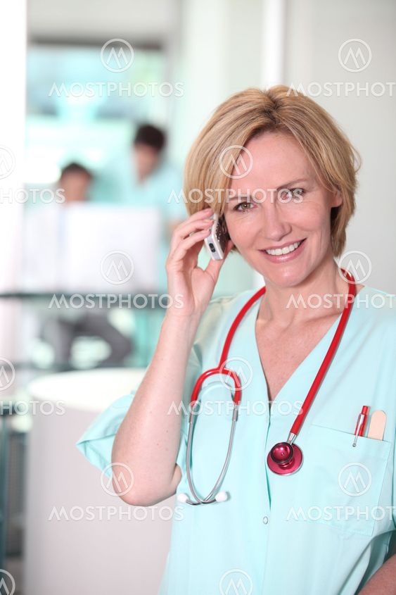 Medic with stethoscope and cellphone