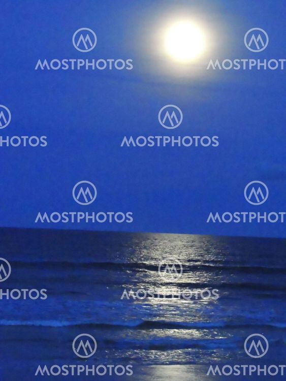 Moon Rising Over Ocean