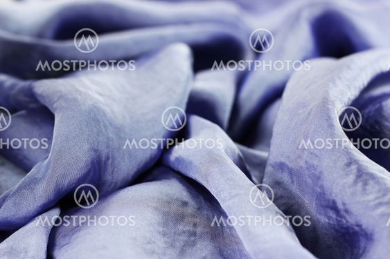 Texture of violet silk fabric with beads