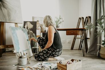 Art, painting and woman with paper or canvas in a home...