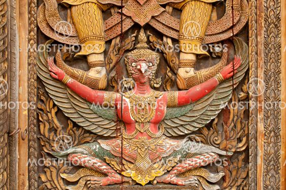 carving Wood at Door of Thailand's Temple
