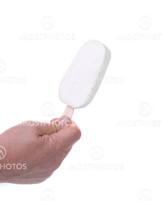 Hand holds vanilla ice cream.
