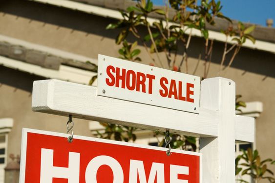 Short Sale Real Estate Sign & New Home