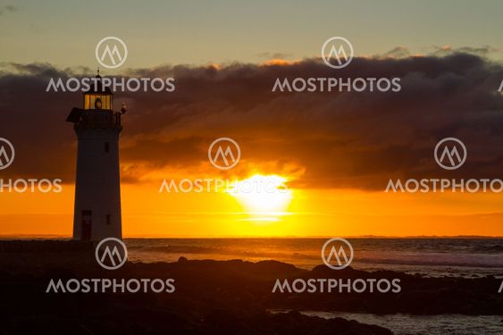 Port Fairy lighthouse, VIC glowing red sunrise