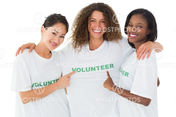 Attractive team of volunteers smiling at camera
