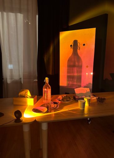 Sunlight casts glowing shadows across afternoon snacks....