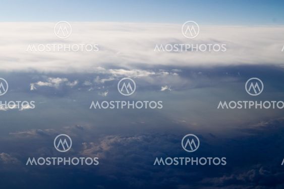 dramatic blue sky with clouds and sun rays