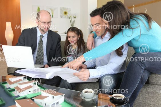 Family with estate agent