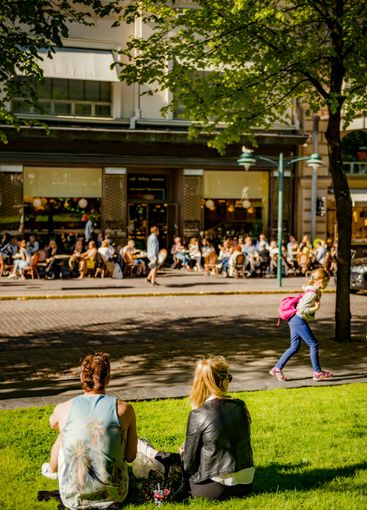 Pedestrians on city street in Helsinki, Finland