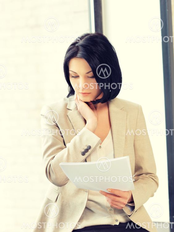 calm woman with documents