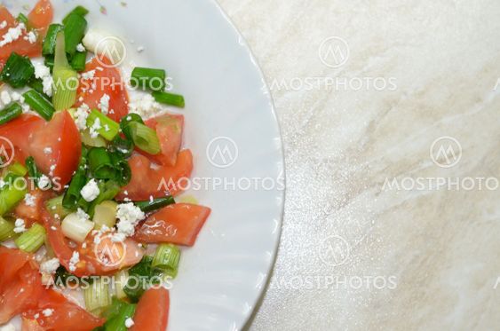 Salad with tomatoes, cheese and onions