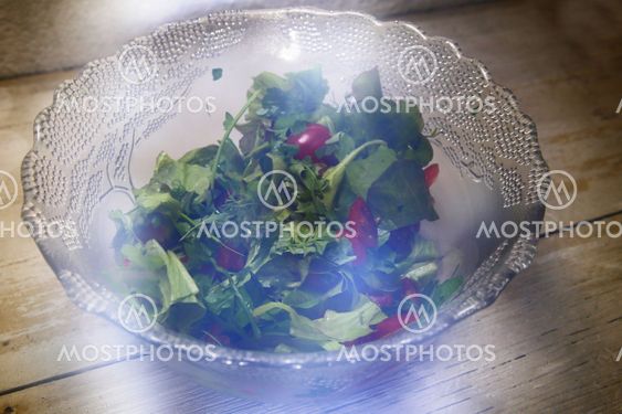 Glass salad bowl with unusual stray light effects