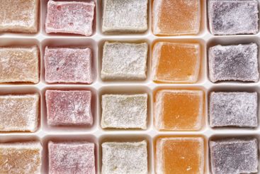 Colorful assortment of traditional confections displayed...