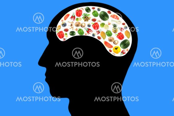 Vegetables and fruits in Head on Blue Background.