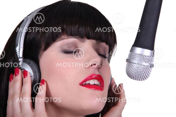 Woman singer in recording studio