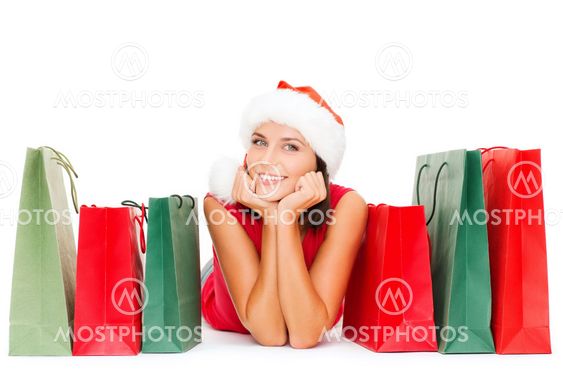 woman in red shirt with shopping bags