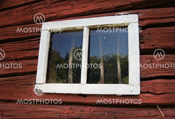 Window of an old wood house of stocks.