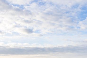 evening sky over river in Kostroma city in winter