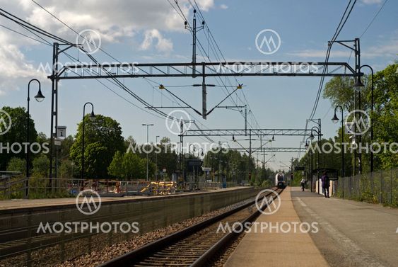 Passagerare vid stationen #13-2