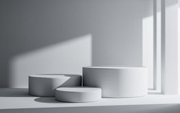 Three white round product podiums in minimal style with...